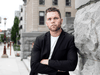 Jarrod Shook, a former inmate at Collins Bay Penitentiary, poses for a portrait on the campus of the University of Ottawa where he is currently studying criminology. Shook was serving a seven-year sentence for robbery when it was announced the then-governing federal Conservatives were making a 30% cut to the daily pay of inmates and eliminating an hourly wage for a work program.