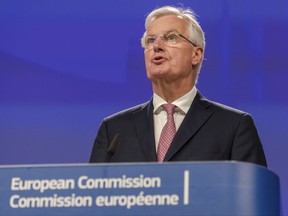 The EU chief Brexit negotiator Michel Barnier addresses the media after a week of negotiations at EU headquarters in Brussels, Thursday July 20, 2017. UK's chief Brexit negotiator says week of talks with EU has given "us a lot to be positive about"(AP Photo/Geert Vanden Wijngaert)