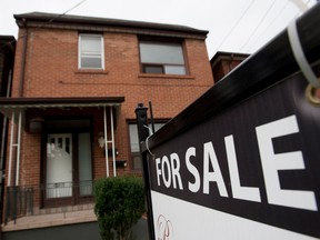 Toronto home prices have plunged more than 17% since their peak in April, which analysts say should delay changes that would make it harder for consumers to borrow.