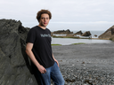 Marcus Hutchins, digital security researcher for Kryptos Logic, poses for a photograph on Tunnels Beaches in Ilfracombe, U.K.,