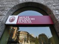 FILE - In this, Sunday, Oct. 26, 2014 file photo, a view of a "Monte Dei Paschi di Siena" bank branch in Milan, Italy. Italy's finance minister said Tuesday, July 4, 2017, the plan to restructure the struggling bank Monte dei Paschi di Siena will provide "a credible future'' for the institution, while ensuring stability to the Italian banking sector. (AP Photo/Luca Bruno, File)