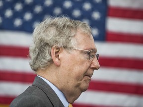 U.S. Sen. Mitch McConnell, R-Ky., speaks to members of the media after a ribbon cutting ceremony for exit 30 on Interstate 65 in Bowling Green, Ky., on Thursday, July 6, 2017. (Austin Anthony/Daily News via AP)