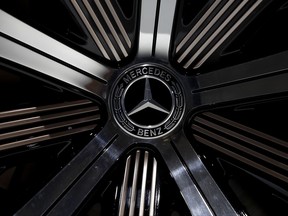 FILE - In this Feb. 2, 2017 file photo the logo of Mercedes-Benz E-Class Coupe is photographed prior to the annual balance news conference at the company's headquarters in Stuttgart, Germany. Automaker Daimler, maker of Mercedes-Benz cars, announces second-quarter earnings, Wednesday, July 26, 2017. (AP Photo/Matthias Schrader, file)