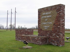 FILE - This March 25, 2017, file photo, shows a sign for the Department of Correction's Cummins Unit prison in Varner, Ark. A judge in Little Rock on Wednesday, July 12, 2017, said that a drug distributor's lawsuit may proceed against the agency. McKesson Medical-Surgical says it doesn't want its products used in Arkansas' death chamber. (AP Photo/Kelly P. Kissel, File)