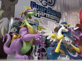 In this Thursday, Oct. 6, 2016, photo, a pair of My Little Pony "Guardians of Harmony" characters, from Hasbro, appear on display at the annual TTPM Holiday Showcase, in New York. On Monday, July 24, 2017, toy maker Hasbro said its second-quarter profit jumped 30 percent, thanks to rising sales of Transformers action figures and Monopoly board games. But its revenue was slightly lower than what Wall Street analysts expected, and it reported weaker demand for Easy-Bake ovens and Playskool toys and softer sales in two international markets. (AP Photo/Richard Drew)