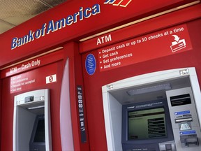 FILE - This  July 18, 2016, file photo shows a Bank of America ATM in Woburn, Mass. Bank of America Corp. reports financial results, Tuesday, July 18, 2017. (AP Photo/Elise Amendola, File)