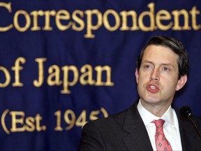 FILE - In this Thursday, March 10, 2005, file photo, Randal Quarles, U.S. assistant secretary of Treasury, speaks to journalists in Tokyo. Quarles, President Donald Trump's choice to be the Federal Reserve's vice chair for bank supervision, would likely favor reducing the capital banks must hold, easing the burden on community banks and allowing firms to do speculative trading. Quarles will likely win a Senate committee's approval Thursday, July 27, 2017. (AP Photo/Shizuo Kambayashi, File)