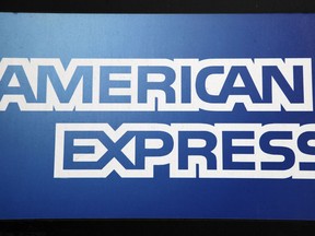 FILE - This Jan. 21, 2015, file photo, shows a sign for American Express outside a New York business. American Express Co. reports financial results, Wednesday, July 19, 2017. (AP Photo/Mark Lennihan, File)