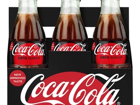 This photo provided by Coca-Cola shows a six-pack of bottled Coca-Cola Zero Sugar. Coke Zero is getting a makeover as Coke Zero Sugar in the United States. The new cans and bottles, which will incorporate more red like regular Coke, will start hitting shelves in August 2017. The company says people didn't always understand that Coke Zero's name means it has no calories. The push comes as Diet Coke's sales continue to decline. (Rodger Macuch/Courtesy of Coca-Cola via AP)