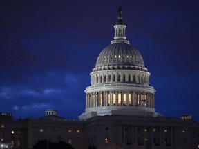 FILE - This April 4, 2017, file photo, shows the Capitol at dawn in Washington. On Thursday, July 13, 2017, the Treasury Department releases federal budget data for June. (AP Photo/J. Scott Applewhite, File)