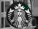FILE - This Tuesday, March 14, 2017, file photo show the Starbucks logo on a shop in downtown Pittsburgh. Starbucks Corp. reports earnings, Thursday, July 27, 2017. (AP Photo/Gene J. Puskar, File)