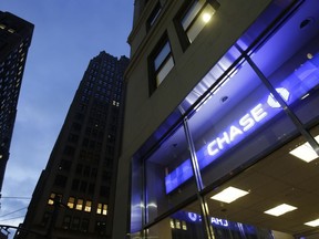 FILE - This Wednesday, Jan. 14, 2015, file photo shows a Chase bank branch, in New York. JPMorgan Chase & Co. reports earnings, Friday, July 14, 2017. (AP Photo/Mark Lennihan, File)