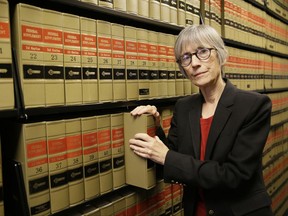 FILE - In this Tuesday, June 28, 2016, file photo, Elizabeth Cabraser, the lead attorney for consumers who sued Volkswagen, poses in her office in San Francisco. Volkswagen agreed to spend up to $15.3 billion to settle consumer lawsuits and government allegations that its diesel vehicles cheated on U.S. emissions tests. Included was up to $10 billion for owners of about 450,000 VWs and Audis to either buy back or repair vehicles with 2-liter engines. Cabraser says the payments are substantial because VW admitted guilt. (AP Photo/Eric Risberg, File)