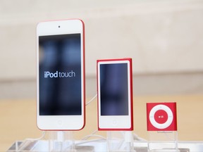 FILE- In this June 11, 2015, file photo, from left, an iPod, iPod Nano and iPod Shuffle are displayed at an Apple store in New York. The company discontinued sales of the iPod Nano and iPod Shuffle on Thursday, July 27, 2017, in a move reflecting the waning popularity of the devices in an era when most people store or stream their tunes on smartphones. (AP Photo/Mark Lennihan, File)
