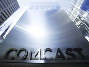 This Wednesday, March 29, 2017, photo shows a sign outside the Comcast Center in Philadelphia. Comcast Corp. reports earnings, Thursday, July 27, 2017. (AP Photo/Matt Rourke)