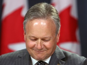 Bank of Canada governor Stephen Poloz starts a news conference concerning the rise of the bank's interest rates, in Ottawa, Wednesday.