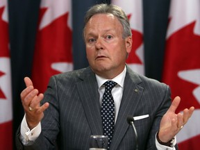 Stephen Poloz, Governor of the Bank of Canada holds a news conference concerning the rise of the bank's interest rates, in Ottawa, Tuesday.