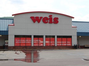 The exterior of the Weis Markets Inc. store in Tunhannock, Pennsylvania, is seen in this July 6, 2017 photo. Weis is planning to reopen this week, more than a month after a gunman killed three co-workers inside the store before killing himself. (AP Photo/Michael Rubinkam)