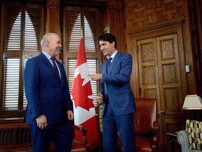 Prime Minister Justin Trudeau meets with Premier of British Columbia John Horgan in his office on Parliament Hill in Ottawa on Tuesday, July 25, 2017. THE CANADIAN PRESS/Sean Kilpatrick