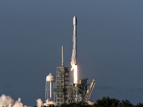 A SpaceX Falcon 9 rocket lifts off from Kennedy Space Center in Cape Canaveral, Fla., Wednesday, July 5, 2017. SpaceX launched an Intelsat satellite on the third try on Wednesday. (Craig Bailey /Florida Today via AP)