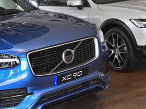 A Volvo XC 90 during an interview with Volvo Cars CEO Hakan Samuelsson at Volvo Cars Showroom in Stockholm, Sweden, Wednesday, July 5, 2017. Samuelsson said that all Volvo cars will be electric or hybrid within two years. The Chinese-owned automotive group plans to phase out the conventional car engine. (Jonas Ekströmer/TT via AP)