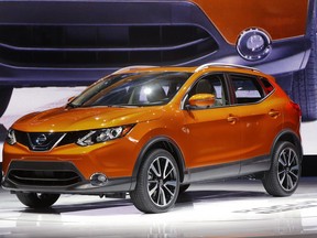 FILE- In this Jan. 9, 2017 file photo, the 2017 Nissan Rogue Sport is on display at the North American International Auto Show in Detroit. The alliance of Japanese automaker Nissan Motor Co. and Renault SA of France says it led in global vehicle sales for the first half of this year, the first time it has claimed top rank. The Nissan-Renault alliance, which includes Mitsubishi Motors Corp., sold nearly 5.3 million vehicles around the world in January-June.(AP Photo/Paul Sancya, File)
