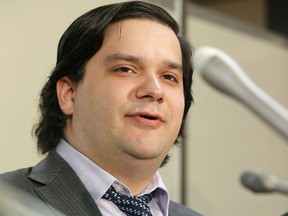 FILE - In this Feb. 28, 2014 file photo, Mt. Gox CEO Mark Karpeles speaks at a press conference at the Justice Ministry in Tokyo. The head of the failed Japan-based bitcoin exchange Mt. Gox is due to appear in Tokyo District Court on Tuesday, July 11, 2017,  to face embezzlement charges.  (AP Photo/Kyodo News, File)
