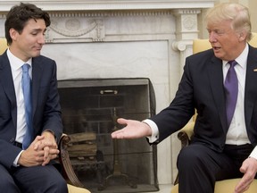 This file photo taken on Feb. 13, 2017 shows US President Donald Trump and Canadian Prime Minister Justin Trudeau  meeting in the Oval Office.