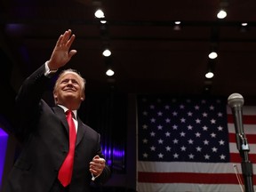 President Donald Trump waves to the audience as he arrives to speak during the Celebrate Freedom event at the Kennedy Center for the Performing Arts in Washington, Saturday, July 1, 2017. (AP Photo/Carolyn Kaster)