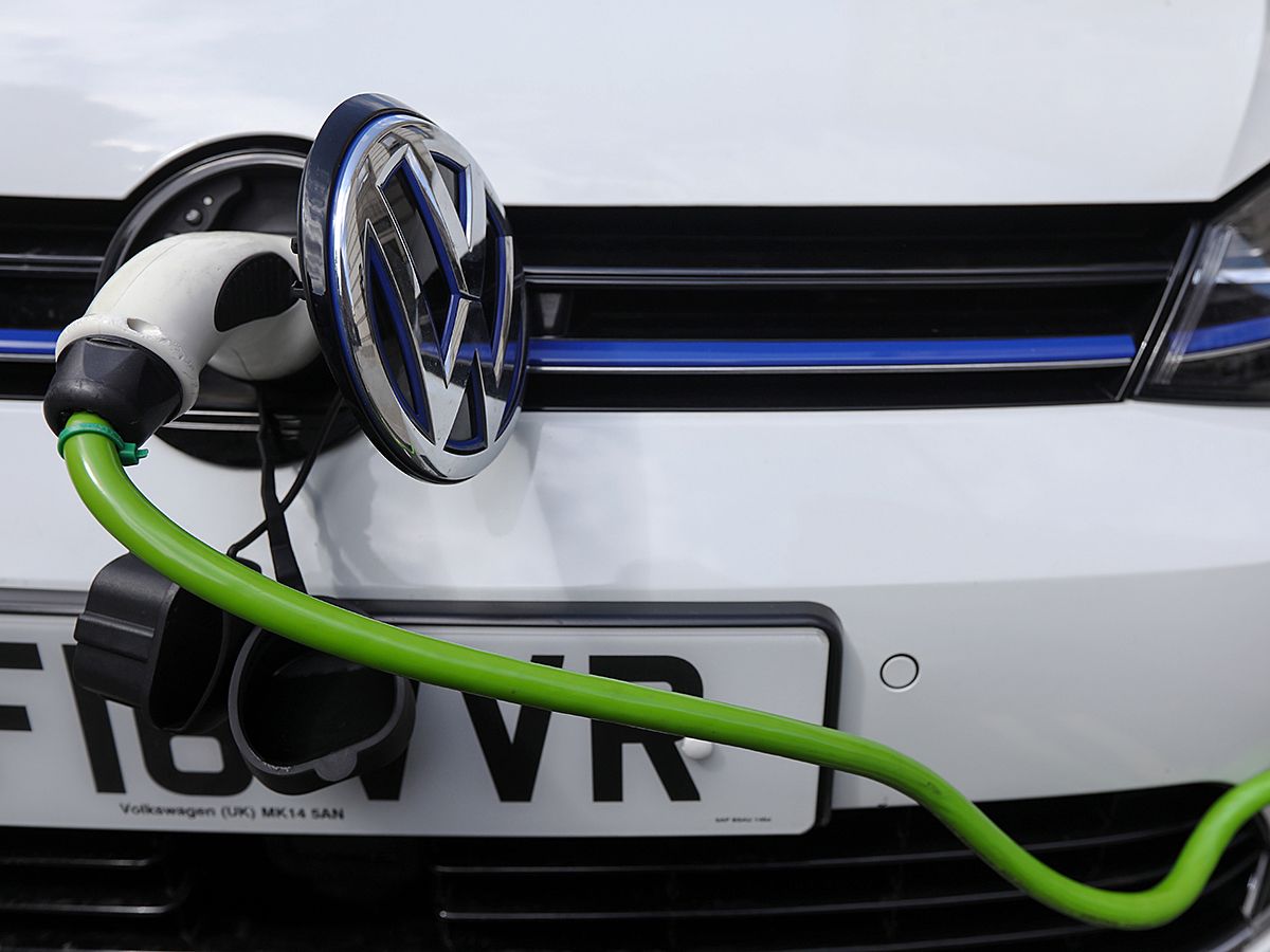 Electric car threatens oil's century-long reign, but change will be slower than the hype