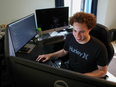 Marcus Hutchins, digital security researcher for Kryptos Logic, works on a computer in his bedroom in Ilfracombe, U.K.