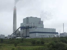 FILE - In this July 6, 2017, file photo, the Longview Power Plant in Maidsville, W.Va. The House voted July 18, 2017, to pass a Republican-backed bill delaying implementation of Obama-era reductions in smog-causing air pollutants. Congress voted 229 to 199 to approve the Ozone Standards Implementation Act of 2017. The measure delays by another eight years implementation of 2015 air pollution standards issued by the Environmental Protection Agency under the prior administration.(AP Photo/Michael Virtanen, File)