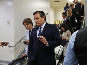 In this July 11, 2017, photo, Sen. Ted Cruz, R-Texas is followed by reporters on Capitol Hill in Washington. A health care proposal from Senate conservatives would let insurers sell skimpy policies provided they also offer a comprehensive alternative. It's being billed as pro-consumer, allowing freedom of choice and potential savings for many. (AP Photo/Jacquelyn Martin)