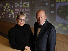 Nancy Knowlton, CEO, and David Martin, CTO, of Nureva stand with their virtual canvas in behind them in this file photo.