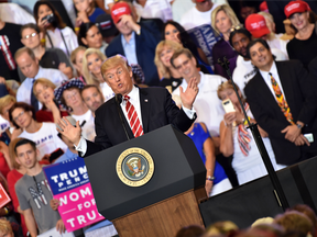 U.S. President Donald Trump addresses a rally in Phoenix, Ariz.