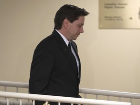 Air Transat pilot Yves Saint-Laurent leaves a Canadian Transportation Agency hearing Thursday August 31, 2017 in Ottawa. Ground crews working two Air Transat flights that faced high-profile tarmac delays this summer say the pilots didn't tell them, nor were they aware, of imminent fuel needs aboard one of the aircraft, nor were they asked for water for the passengers. THE CANADIAN PRESS/Adrian Wyld