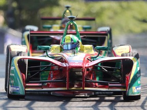 ABT Schaeffler FE02 driver Lucas di Grassi, of Brazil, drives through the chican on his way to winning the season three driver's championship at the Montreal Formula ePrix electric car race, in Montreal on July 30.