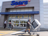 Bargain hunters are seen at the Sears store in St. Eustache, Que. The company is in bankruptcy protection.