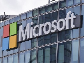 FILE - This April 12, 2016, file photo shows the Microsoft logo in Issy-les-Moulineaux, outside Paris, France. Consumer Reports said Thursday, Aug. 10, 2017, that it can no longer recommend multiple Microsoft laptops or tablets because of poor reliability compared to other brands. (AP Photo/Michel Euler, File)