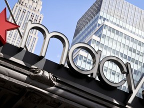 This Tuesday, May 2, 2017, photo shows Macy's corporate signage at its flagship store in New York. Macy's and Best Buy are expanding their same-day delivery as they aim to become more competitive with online leader Amazon. (AP Photo/Bebeto Matthews)