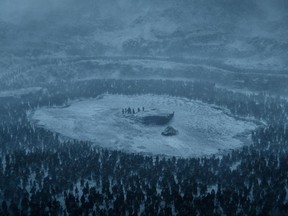 This photo provided by HBO shows a scene from the sixth episode of the seventh season of HBO's "Game of Thrones." Dragons fought zombies in a thunderous battle on "Game of Thrones" on Sunday, Aug. 20, 2017, a showdown that provides just a hint of what likely lies ahead in the show's final season. Yet the battle also raised an economic question: Can the White Walkers' command and control economy defeat their disorganized, squabbling Westerosi opponents? (Courtesy of HBO via AP)