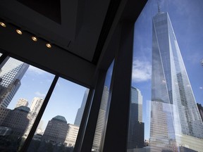 FILE - In this Aug. 15, 2016, file photo, window seating in the Eataly restaurant offers a view of One World Trade Center, right, in New York. On Tuesday, Aug. 15, 2017, the Federal Reserve Bank of New York issues its Empire State manufacturing index for August. (AP Photo/Mark Lennihan, File)