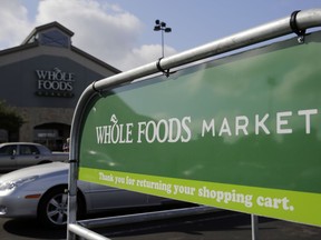 This Friday, June 16, 2017, photo shows a Whole Foods Market in San Antonio. Whole Foods shareholders voted Wednesday, Aug. 23, 2017, to bless a $13.7 billion union with Amazon that the organic grocery chain's CEO had called "love at first sight." By buying Whole Foods, Amazon will get more than 460 stores and potentially very lucrative data about how shoppers behave offline. (AP Photo/Eric Gay)