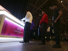 FILE - In this Friday, May 19, 2017, file photo, job seekers line up to check in at the Opportunity Fair and Forum employment event in Dallas. On Thursday, Aug. 10, 2017, the Labor Department reports on the number of people who applied for unemployment benefits a week earlier. (AP Photo/LM Otero, File)