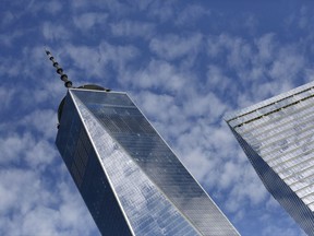 FILE - This Tuesday, Aug. 16, 2016, file photo shows One World Trade Center, left, and 7 World Trade Center, in New York. Technology companies were leading a broad slide in U.S. stocks in early trading Thursday, Aug. 10, 2017, as investors pored over the latest batch of corporate earnings reports. (AP Photo/Mark Lennihan, File)