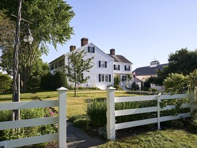 This July, 13, 2017, photo provided by Yankee Magazine shows an oceanfront home where E.B. White lived when he penned "Charlotte's Web." The home where White lived until his death in 1985 dates to the late 1700s and includes a barn that was the setting for the beloved children's book featuring a pig named Wilbur and a spider named Charlotte. (Mark Fleming/Yankee Magazine via AP)