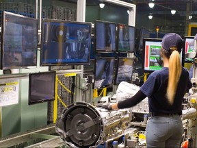 This undated photo provided by AW North Carolina shows production operations inside the company's Durham, N.C., factory. Online thieves are increasingly hitting today's just-in-time manufacturing sector with cyberattacks that demand ransom to make computer malware go away. Malware entered the North Carolina transmission plant's computer network via email last August, spreading like a virus and threatening to lock up the production line until the company paid a ransom. (AW North Carolina via AP)