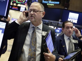 Traders on the floor of the New York Stock Exchange