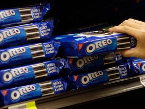 Oreo cookies maker Mondelez International Inc will increase its quarterly cash dividend by 16 per cent to 22 cents per share.