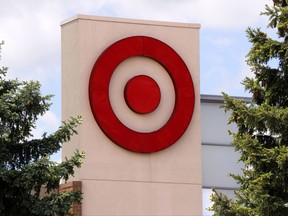 This May 3, 2017, photo shows the logo on a Target store in Upper Saint Clair, Pa. Target says it is buying delivery logistics company Grand Junction to help it offer same-day delivery service to its in-store shoppers. Grand Junction's software connects retailers with about 700 delivery companies around the country that pick up items from distribution centers and take them to customers. (AP Photo/Gene J. Puskar)